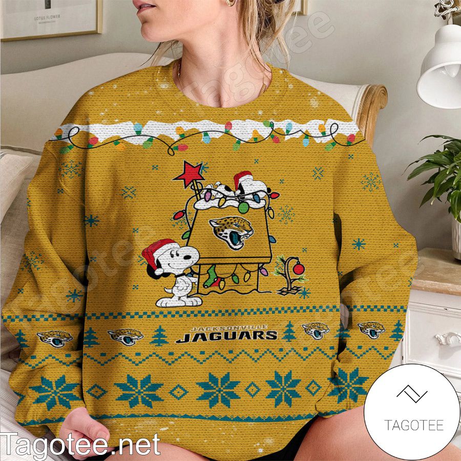Jacksonville Jaguars Snoopy NFL Ugly Christmas Sweater - Tagotee